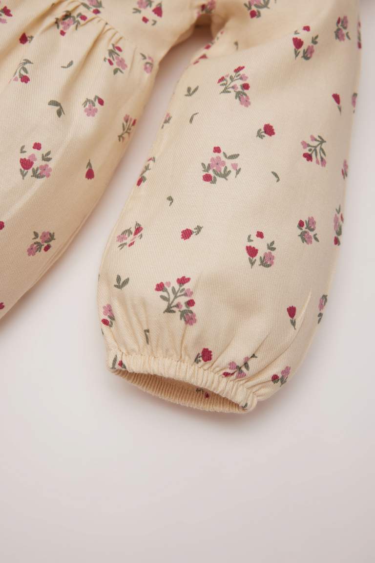 Robe à manches longues en twill fleuri pour bébé fille