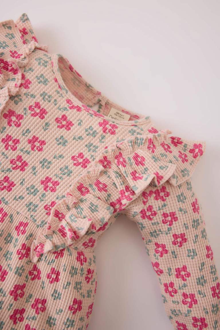 Robe en waffle fleurie à manches longues pour bébé fille