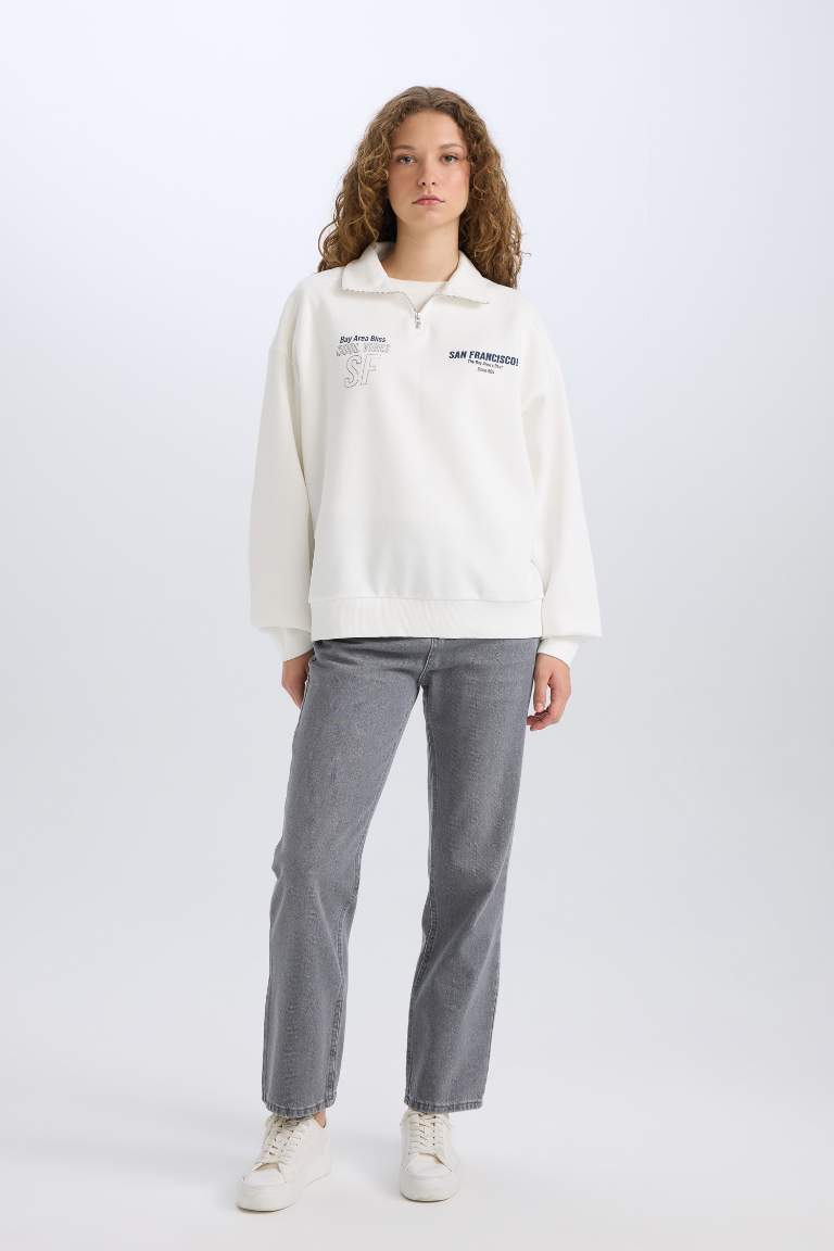 Sweatshirt Oversize demi-zippé imprimé dans le dos