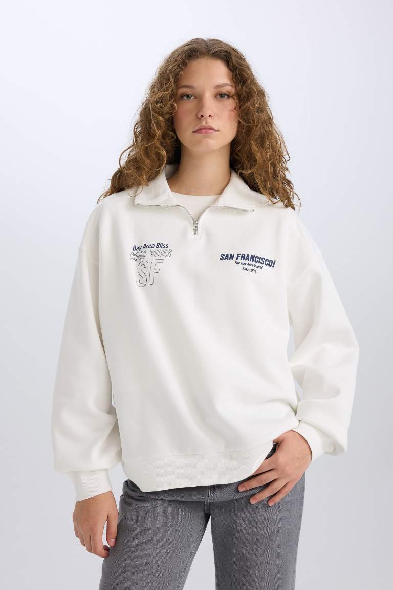 Sweatshirt Oversize demi-zippé imprimé dans le dos