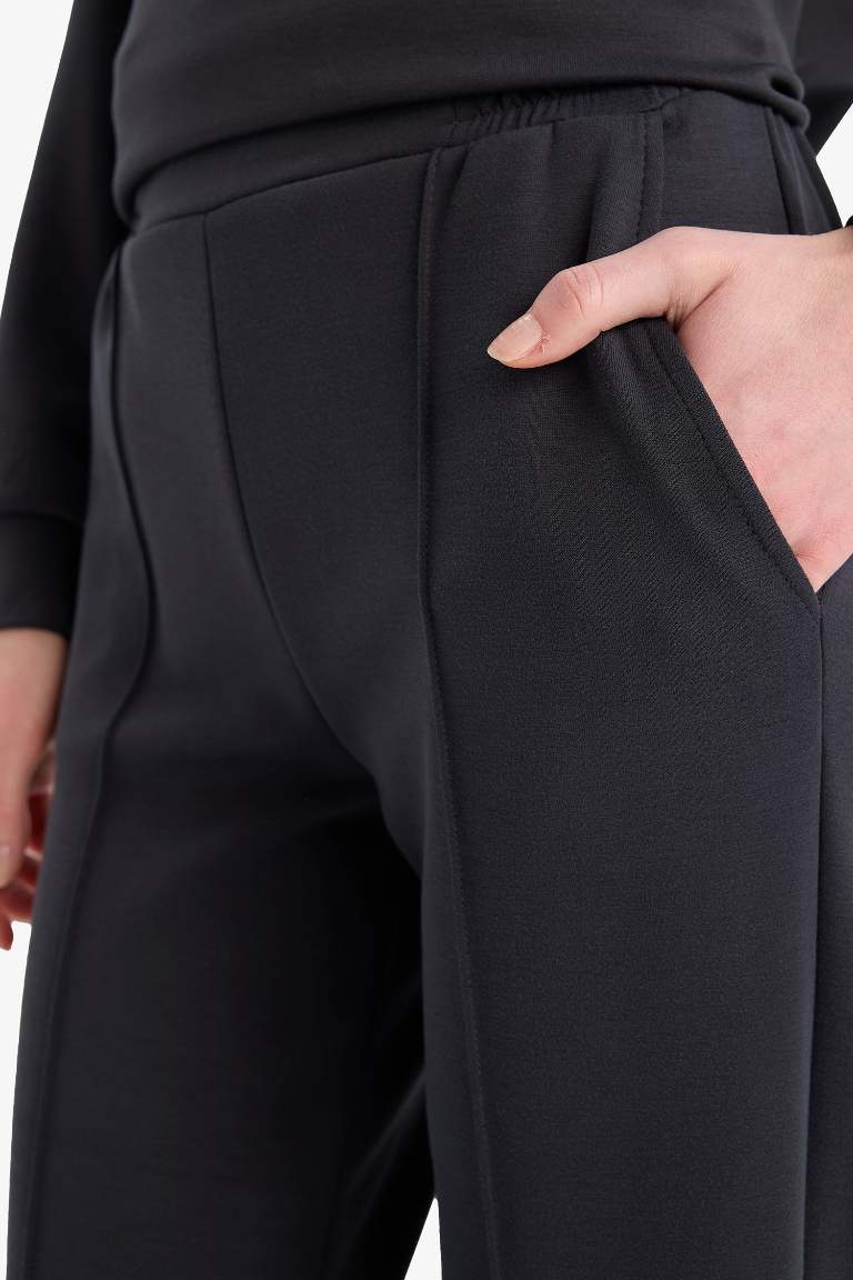 Pantalon basique avec poches à taille élastique Coupe régulière