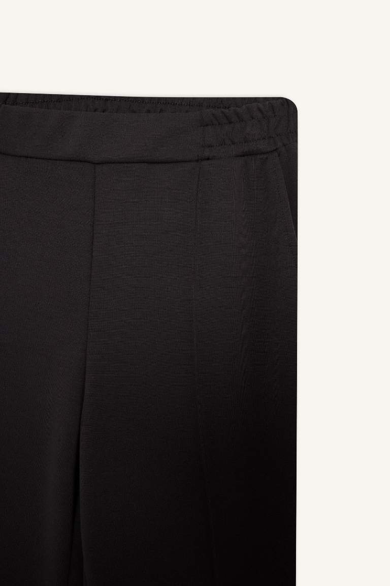 Pantalon basique avec poches à taille élastique Coupe régulière