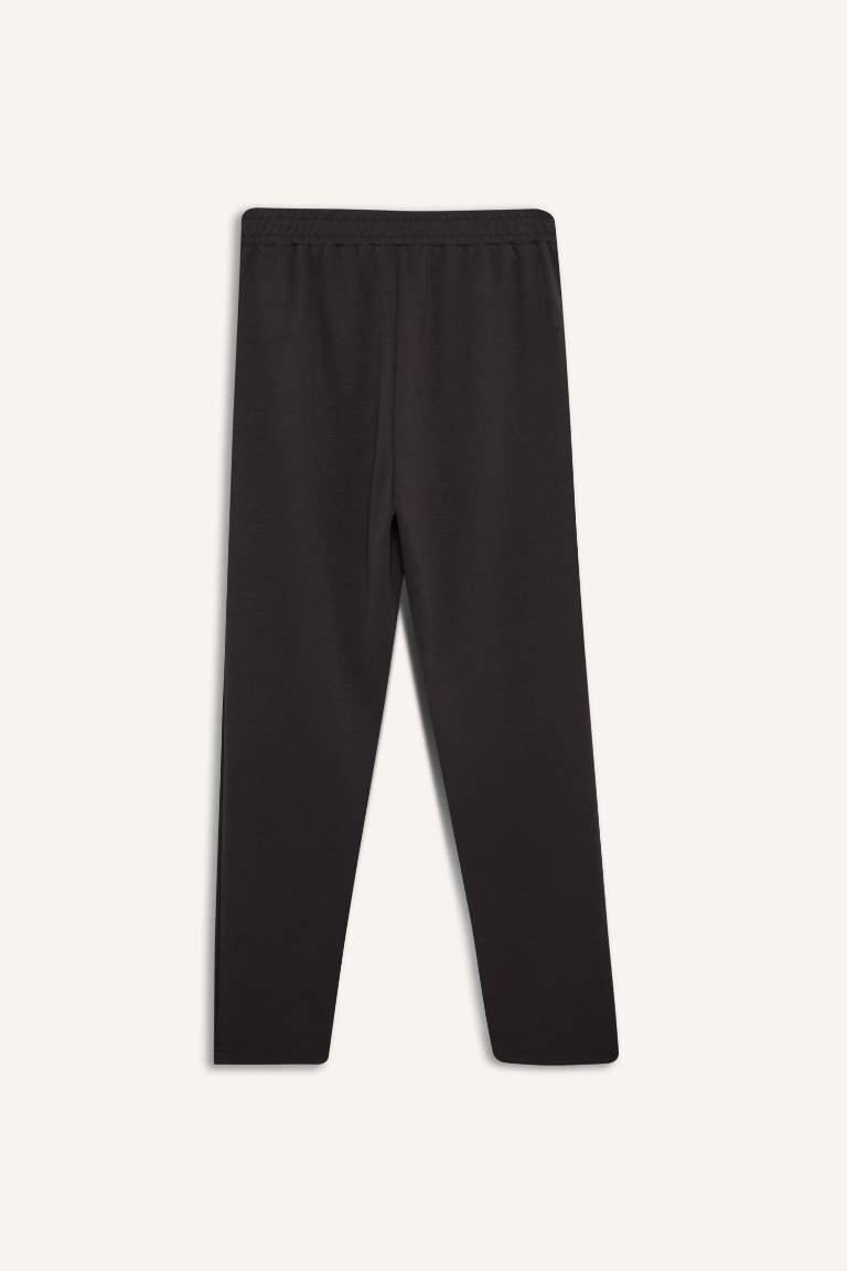 Pantalon basique avec poches à taille élastique Coupe régulière