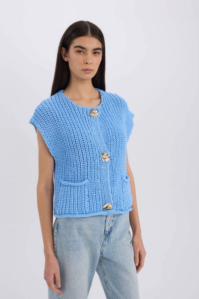 Pull en tricot sans manches décontracté boutonné avec poches