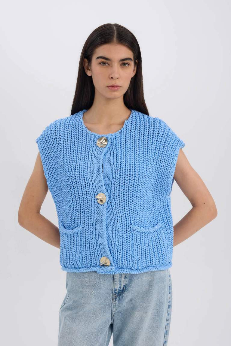 Pull en tricot sans manches décontracté boutonné avec poches