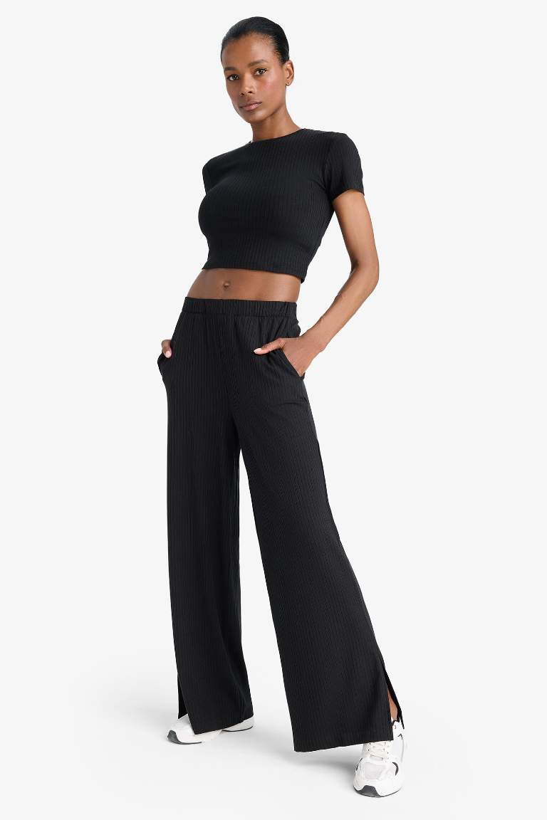 DeFactoFit Wide Leg Cepli Geniş Paça Yırtmaçlı Uzun İnce Sporcu Pantolon