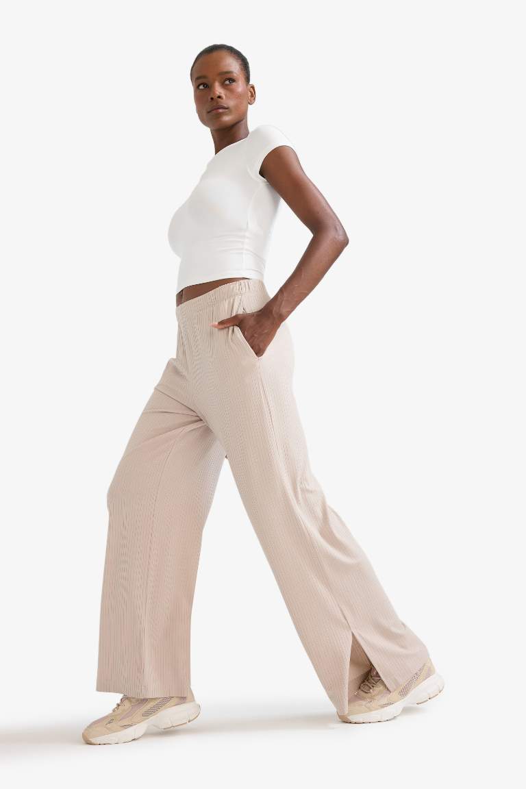 DeFactoFit Wide Leg Cepli Geniş Paça Yırtmaçlı Uzun İnce Sporcu Pantolon