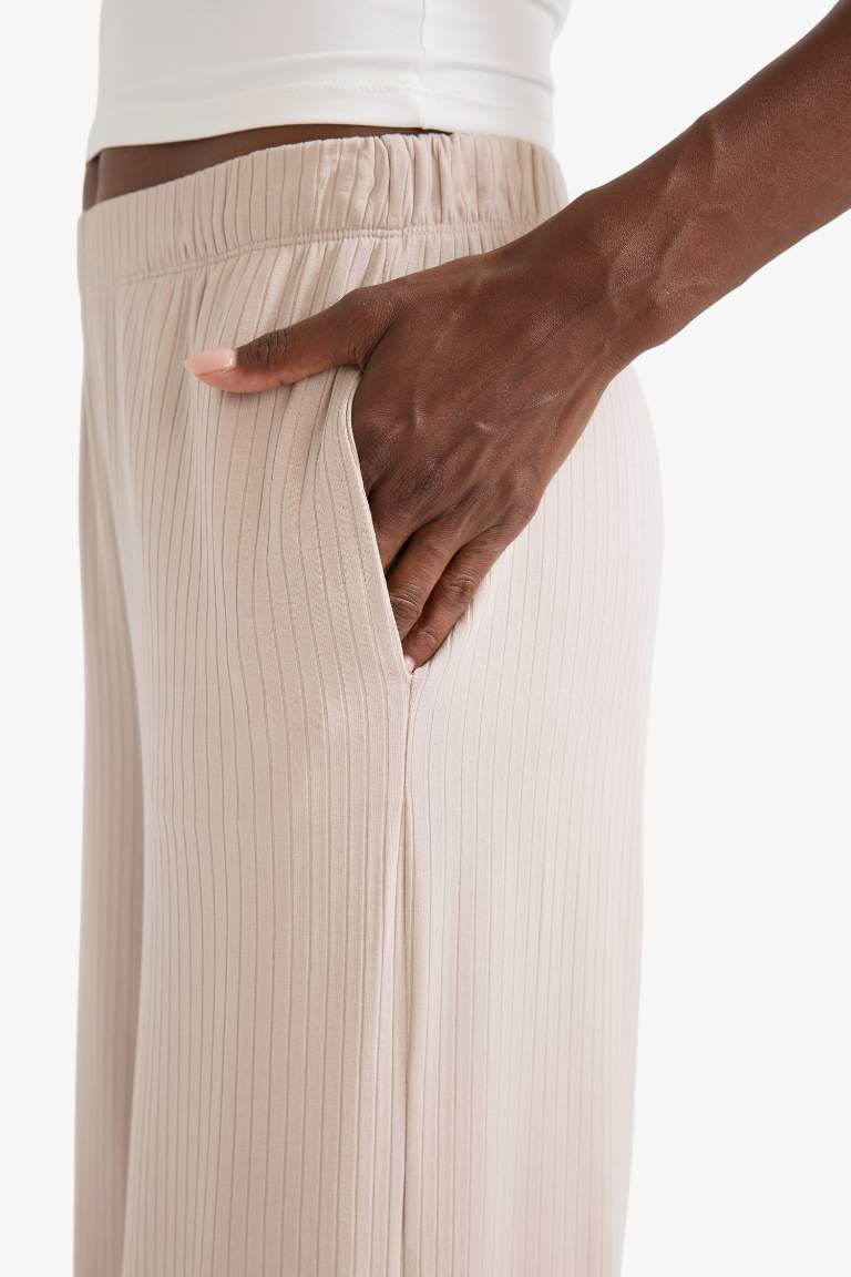 DeFactoFit Wide Leg Cepli Geniş Paça Yırtmaçlı Uzun İnce Sporcu Pantolon