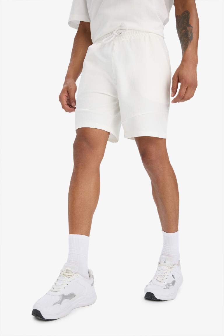 DeFactoFit Standart Fit Sporcu Beli Bağcıklı Cepli Şort
