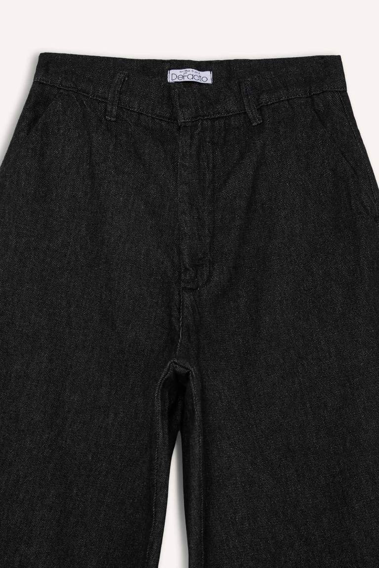 سروال جينز واسع بخصر عالي