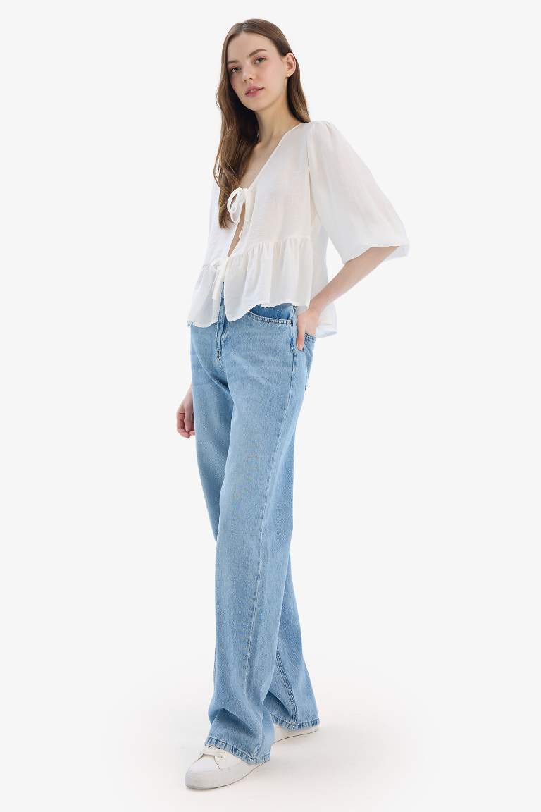 Pantalon Jean droit large taille haute