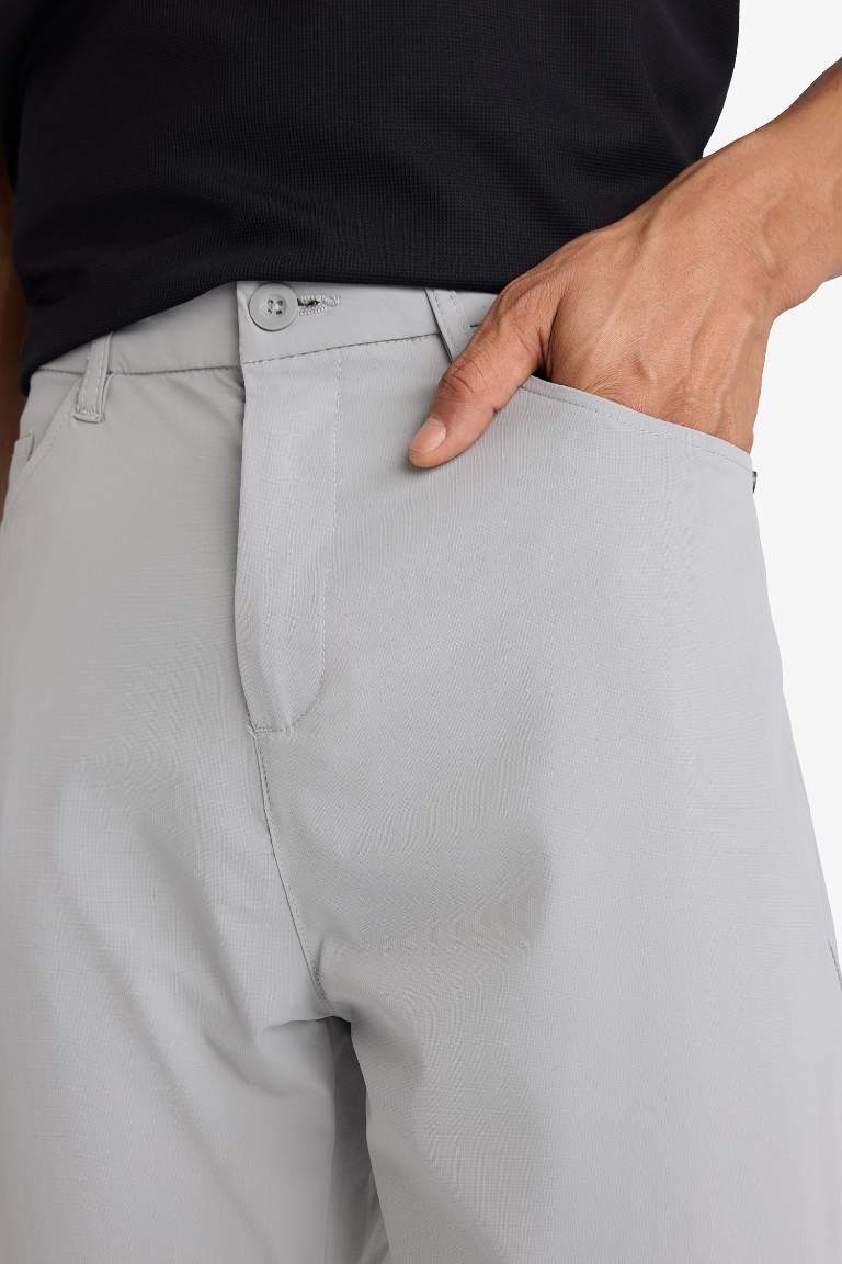 DeFactoFit Slim Fit Dar Kesim Standart Paça Dokuma Sporcu Pantolon