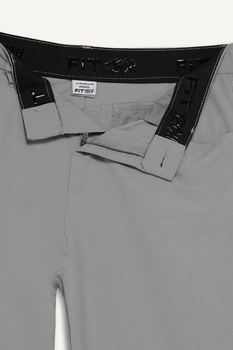DeFactoFit Slim Fit Dar Kesim Standart Paça Dokuma Sporcu Pantolon