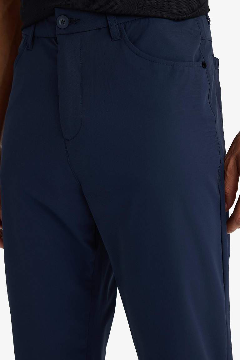 DeFactoFit Slim Fit Dar Kesim Standart Paça Dokuma Sporcu Pantolon