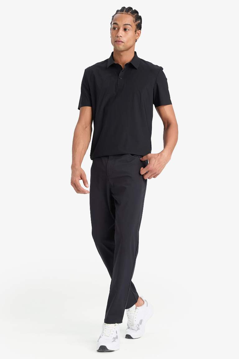 DeFactoFit Slim Fit Dar Kesim Standart Paça Esnek Multifonksiyonel Dokuma Sporcu Pantolon