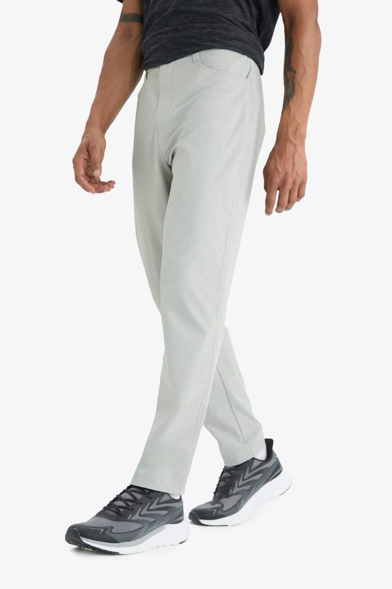 DeFactoFit Slim Fit Dar Kesim Standart Paça Esnek Multifonksiyonel Dokuma Sporcu Pantolon