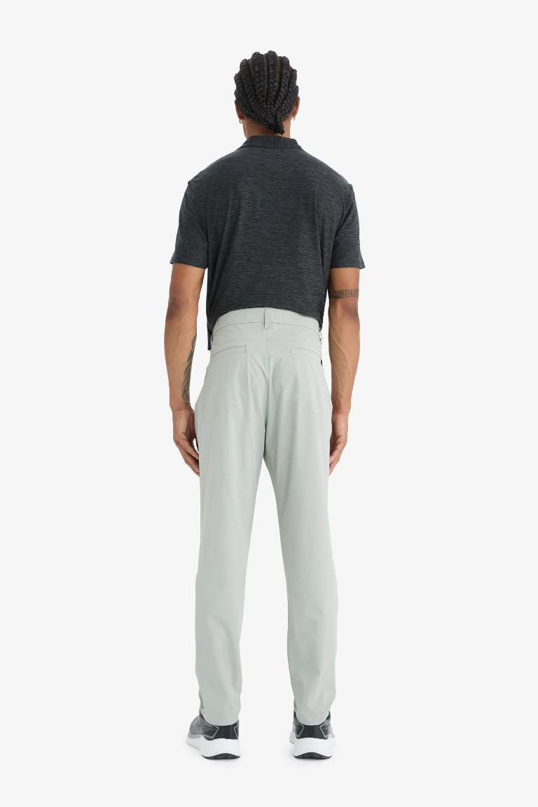 DeFactoFit Slim Fit Dar Kesim Standart Paça Esnek Multifonksiyonel Dokuma Sporcu Pantolon
