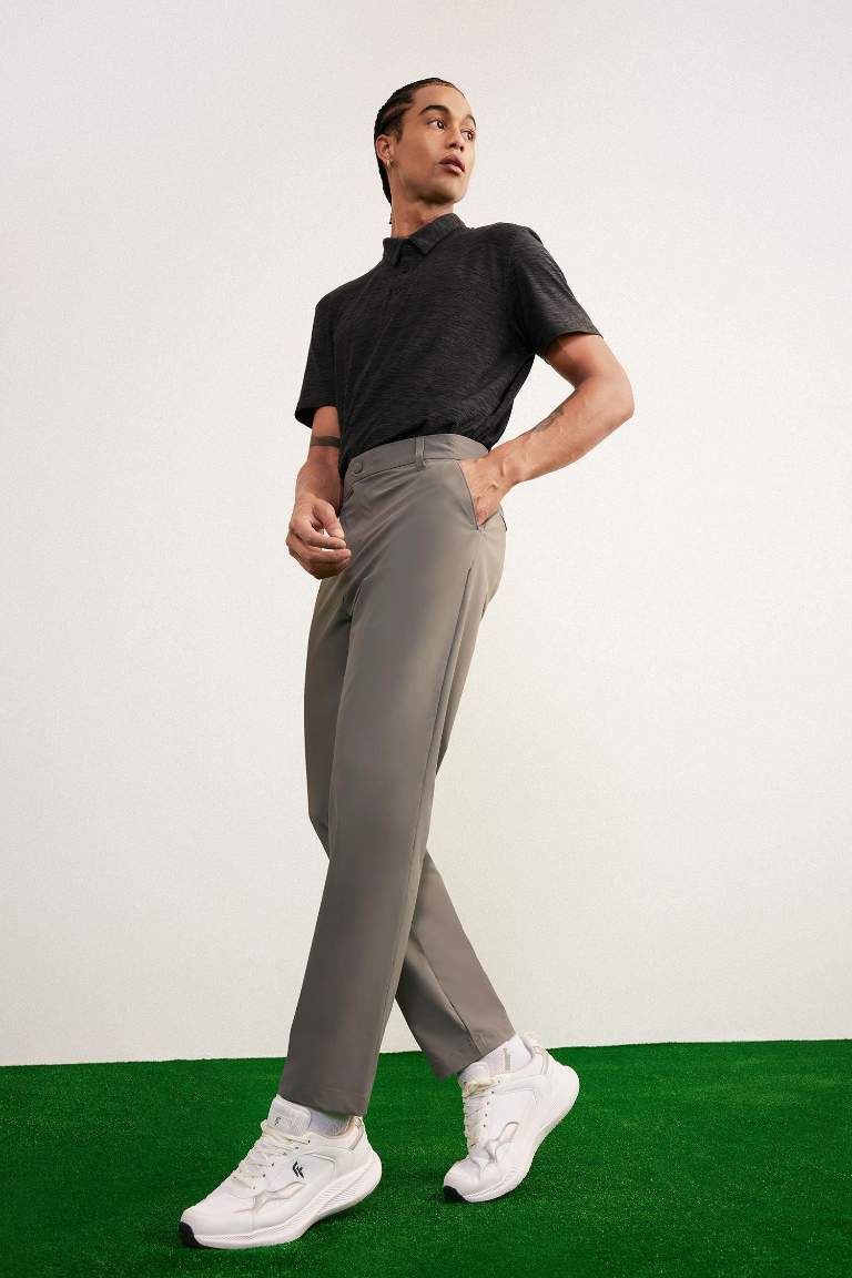 DeFactoFit Slim Fit Dar Kesim Standart Paça Esnek Multifonksiyonel Dokuma Sporcu Pantolon