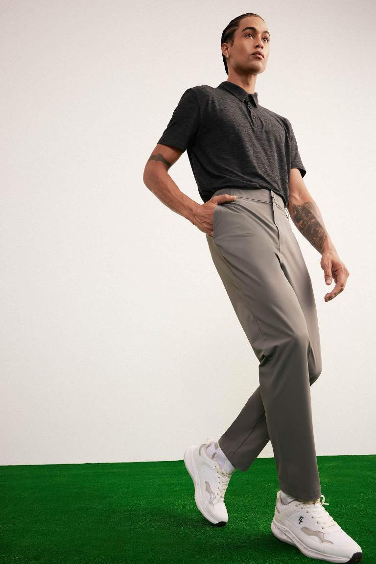 DeFactoFit Slim Fit Dar Kesim Standart Paça Esnek Multifonksiyonel Dokuma Sporcu Pantolon