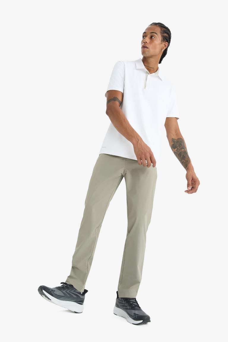DeFactoFit Slim Fit Dar Kesim Standart Paça Esnek Multifonksiyonel Dokuma Sporcu Pantolon