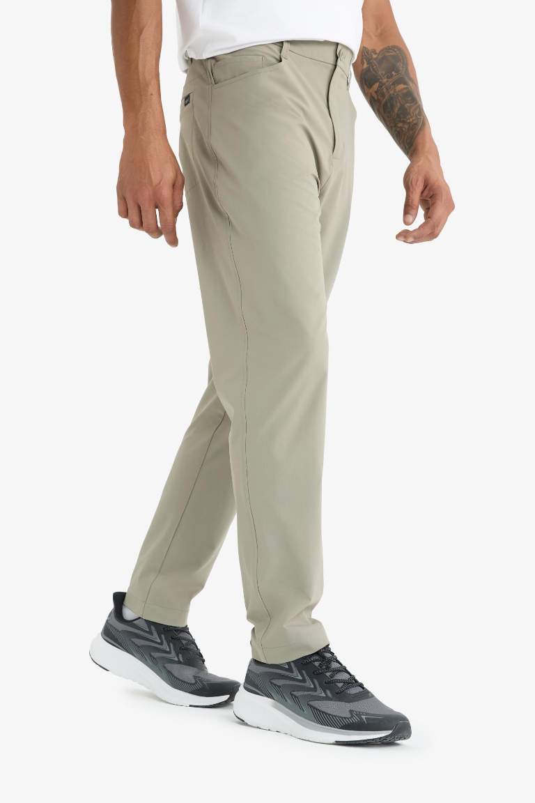 DeFactoFit Slim Fit Dar Kesim Standart Paça Esnek Multifonksiyonel Dokuma Sporcu Pantolon