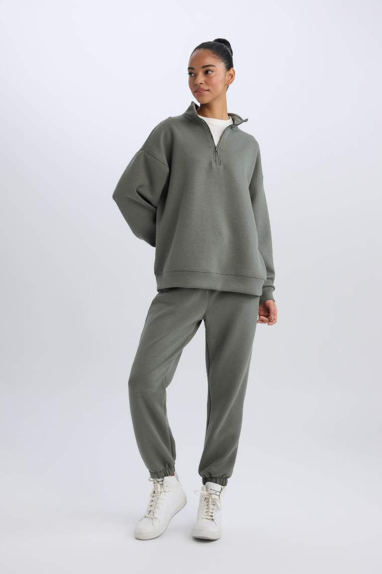 DeFactoFit Standart Fit Uzun İnce Jogger Eşofman Altı Cepli Beli Paçası Lastikli