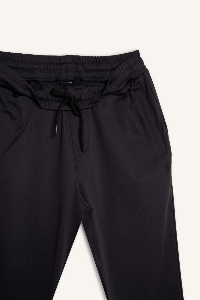 DeFactoFit Sporcu Jogger Eşofman Altı Slim Fit Dar Kesim Standart Paça Skuba Dalgıç Kumaş Beli Lastikli Düz Paça
