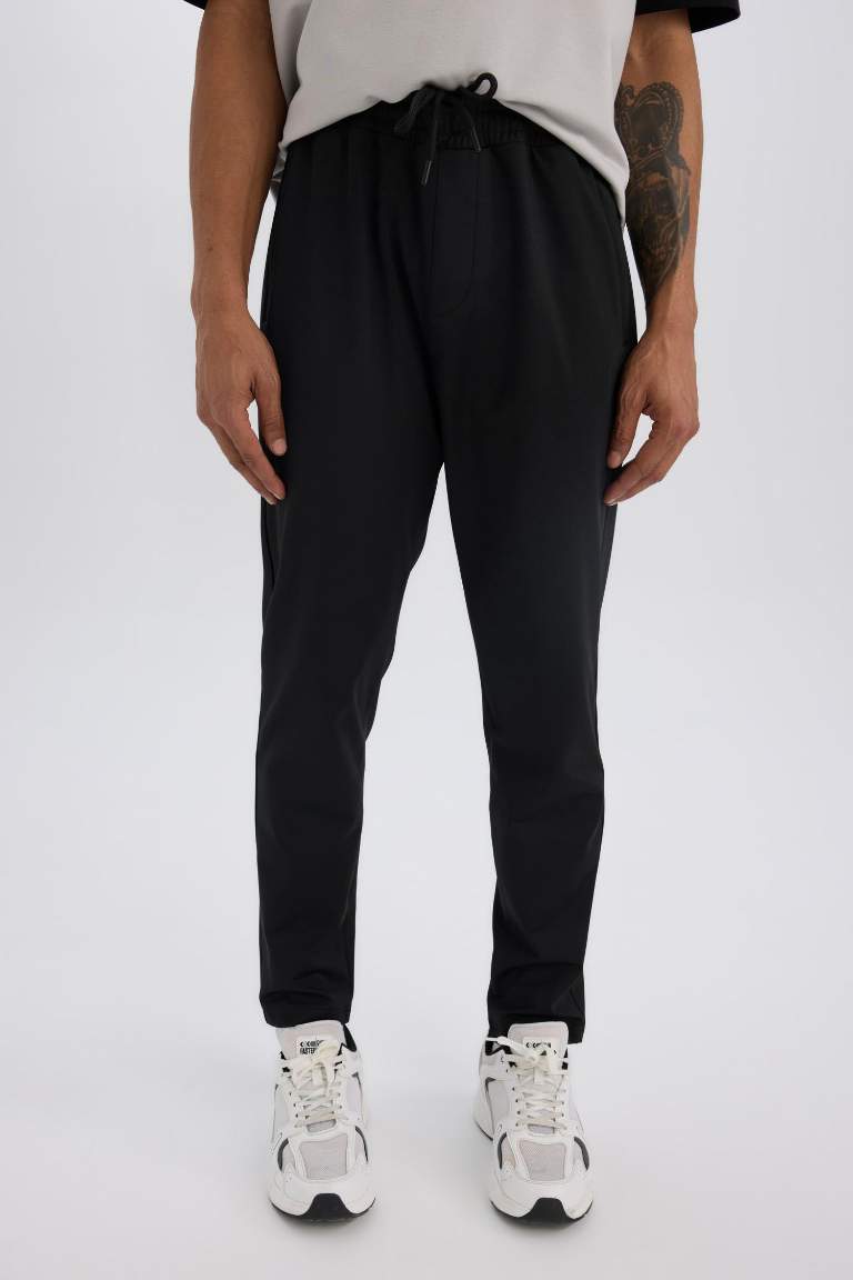 DeFactoFit Sporcu Jogger Eşofman Altı Slim Fit Dar Kesim Standart Paça Skuba Dalgıç Kumaş Beli Lastikli Düz Paça