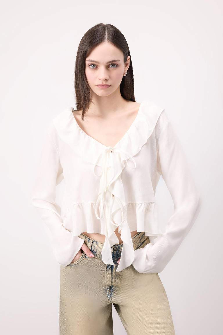 Blouse à manches longues en viscose avec nœud à coupe régulière