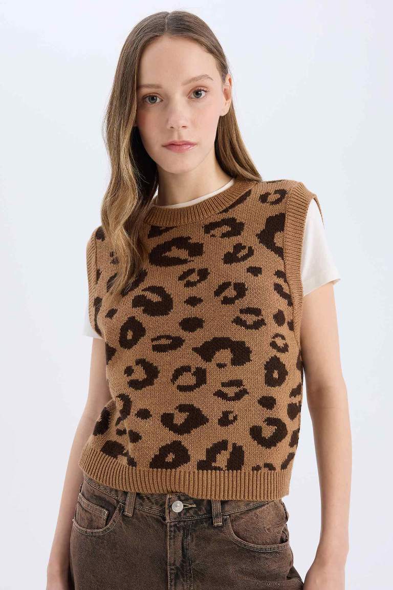 Pull tricot sans manches à effet léopard à col rond et coupe régulière