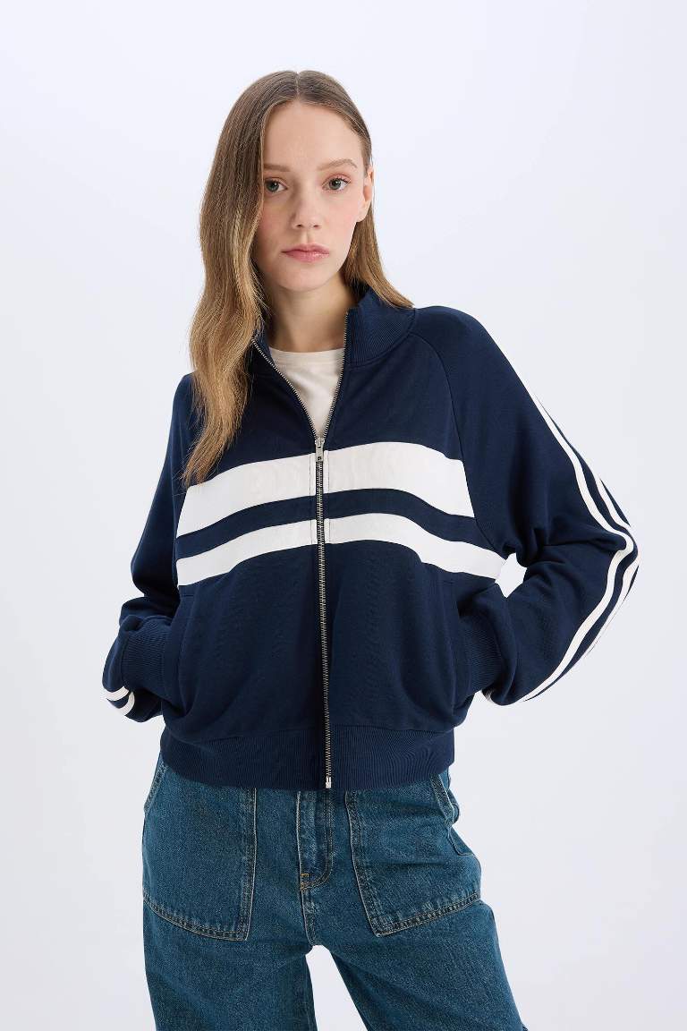 Sweatshirt à col montant avec fermeture zip et poches