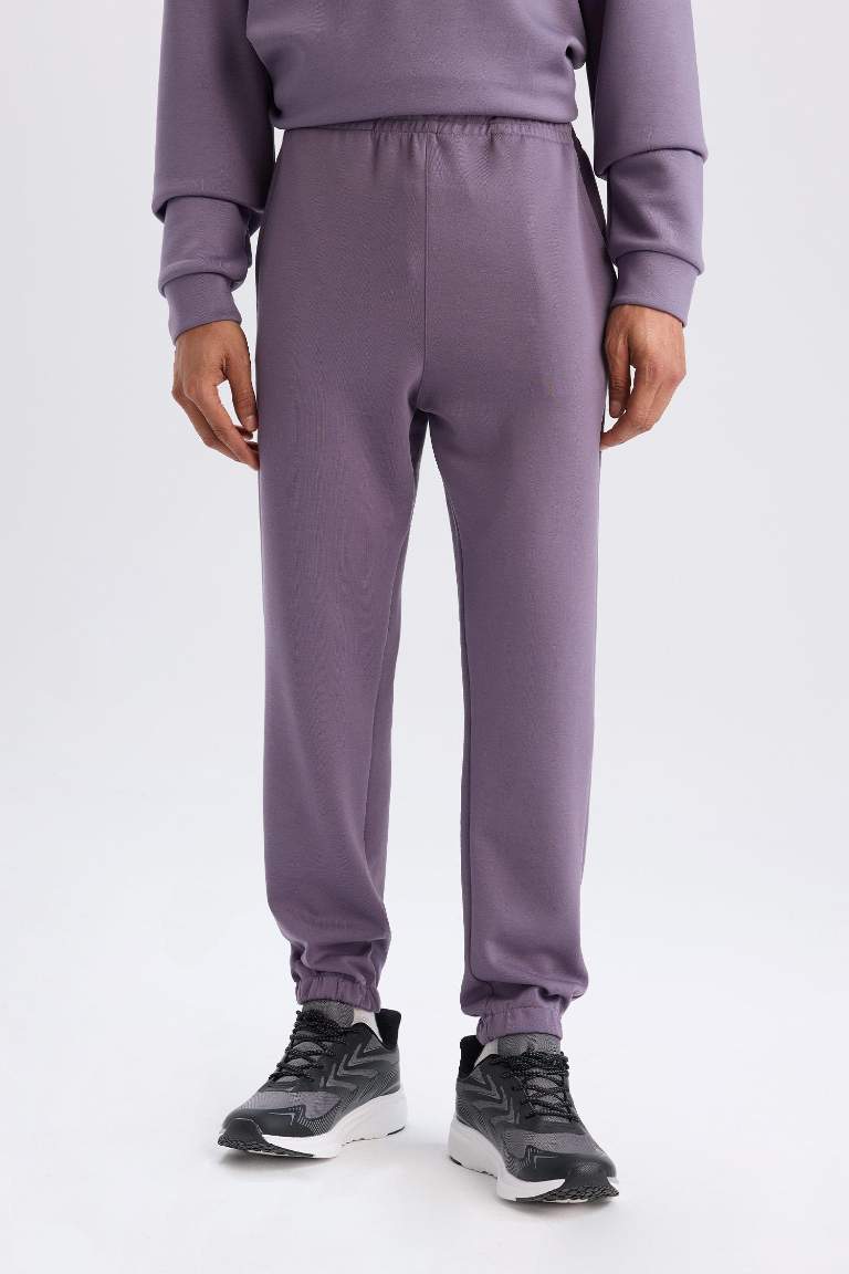 DeFactoFit Standart Fit Cep Detaylı Jogger Paça Skuba Dalgıç Kumaş Sporcu Jogger