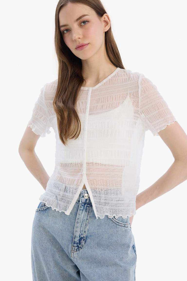 Top slim en tulle à col rond et manches courtes