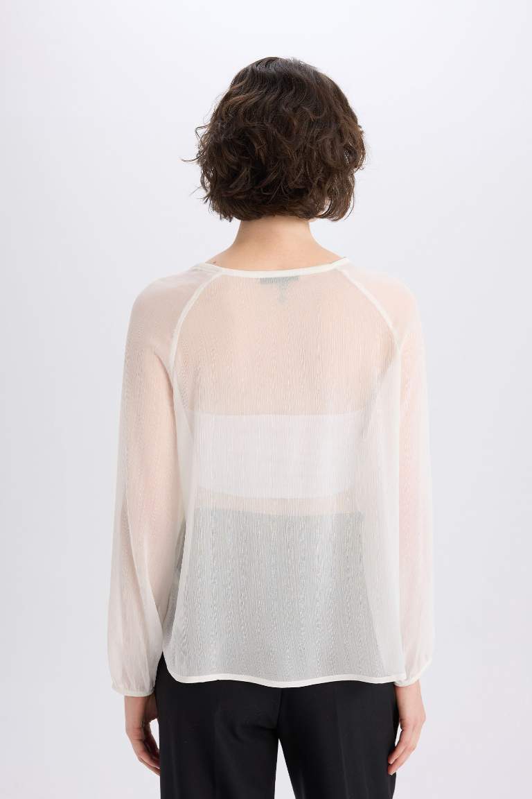 Blouse en chiffon avec volants à col rond et coupe régulière