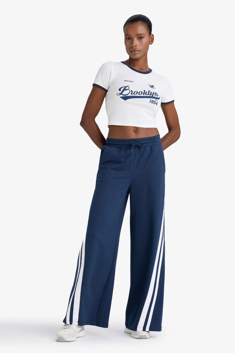 DeFactoFit Wide Leg Geniş Paça Şeritli Standart Boy Sporcu Pantolon