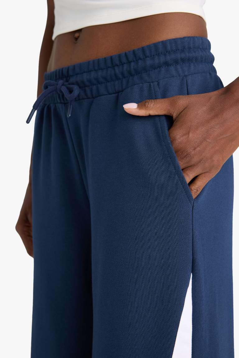 DeFactoFit Wide Leg Geniş Paça Şeritli Standart Boy Sporcu Pantolon
