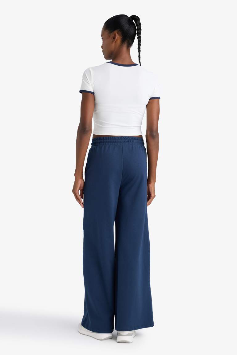 DeFactoFit Wide Leg Geniş Paça Şeritli Standart Boy Sporcu Pantolon