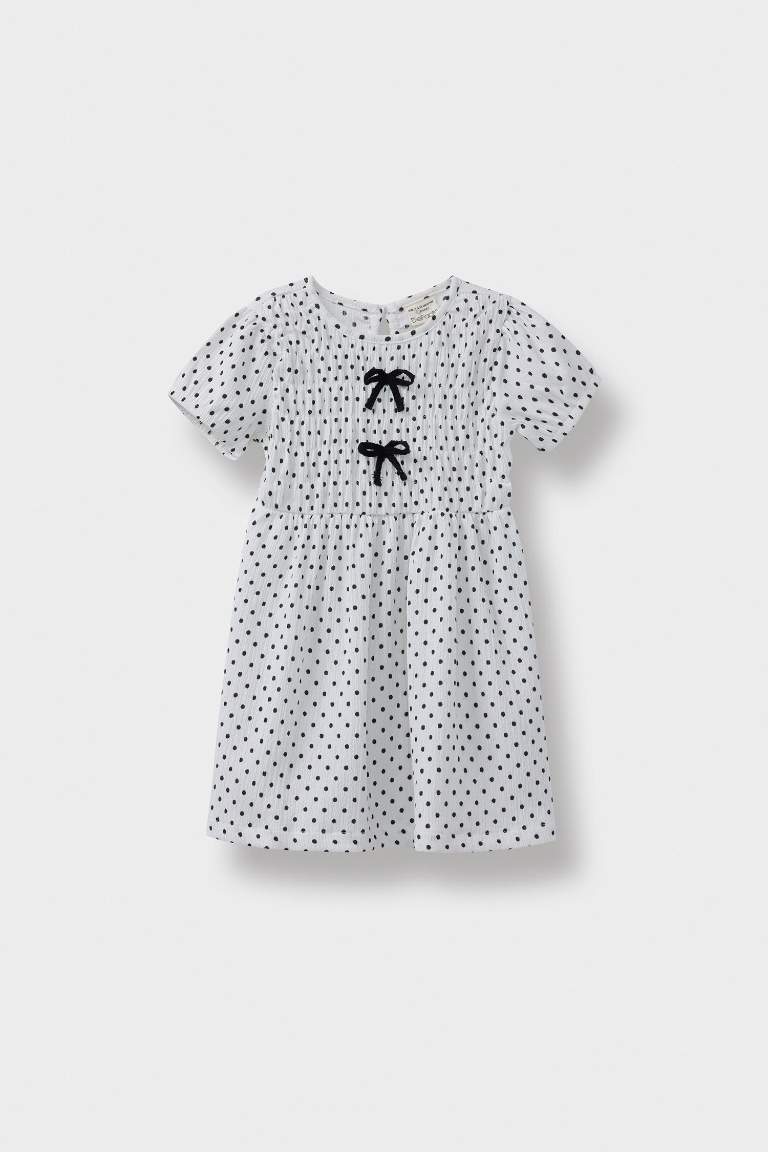 فستان بيبي بناتي منقط قصة عادية نص ردن بياخة مستديرة