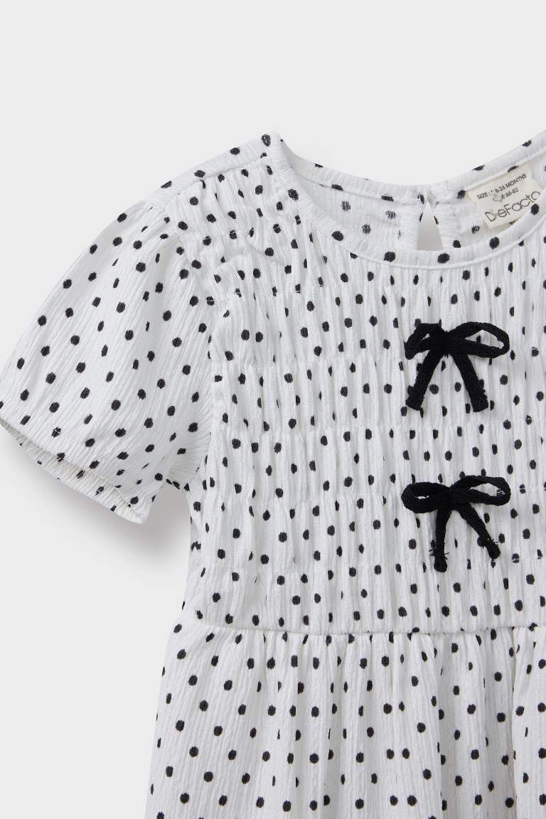 فستان بيبي بناتي منقط قصة عادية نص ردن بياخة مستديرة