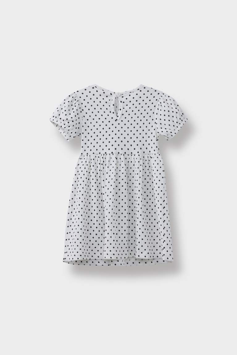 فستان بيبي بناتي منقط قصة عادية نص ردن بياخة مستديرة