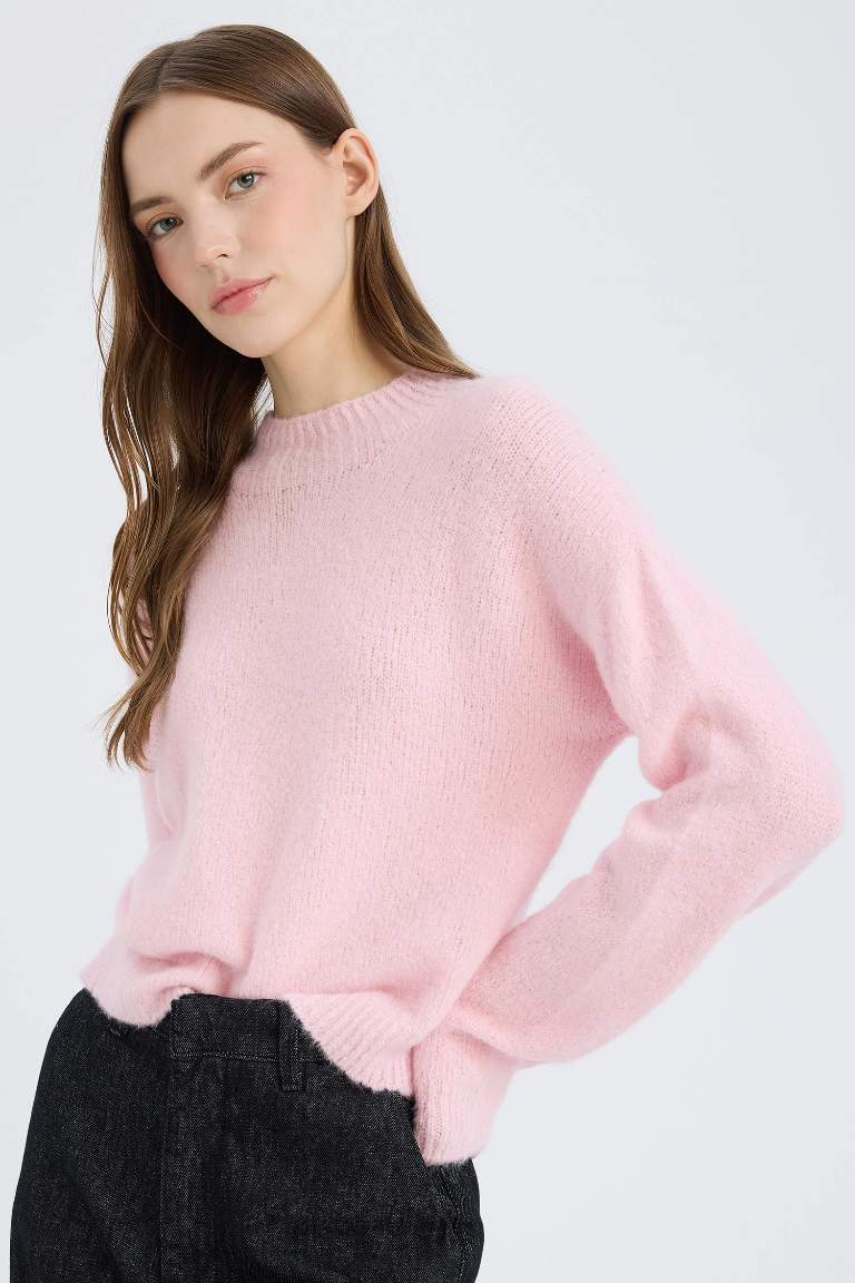 Pull tricot basique sans couture à col rond et coupe régulière