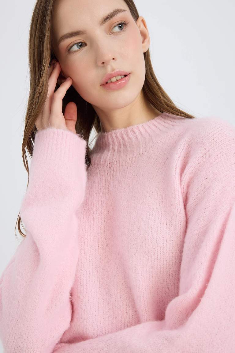 Pull tricot basique sans couture à col rond et coupe régulière