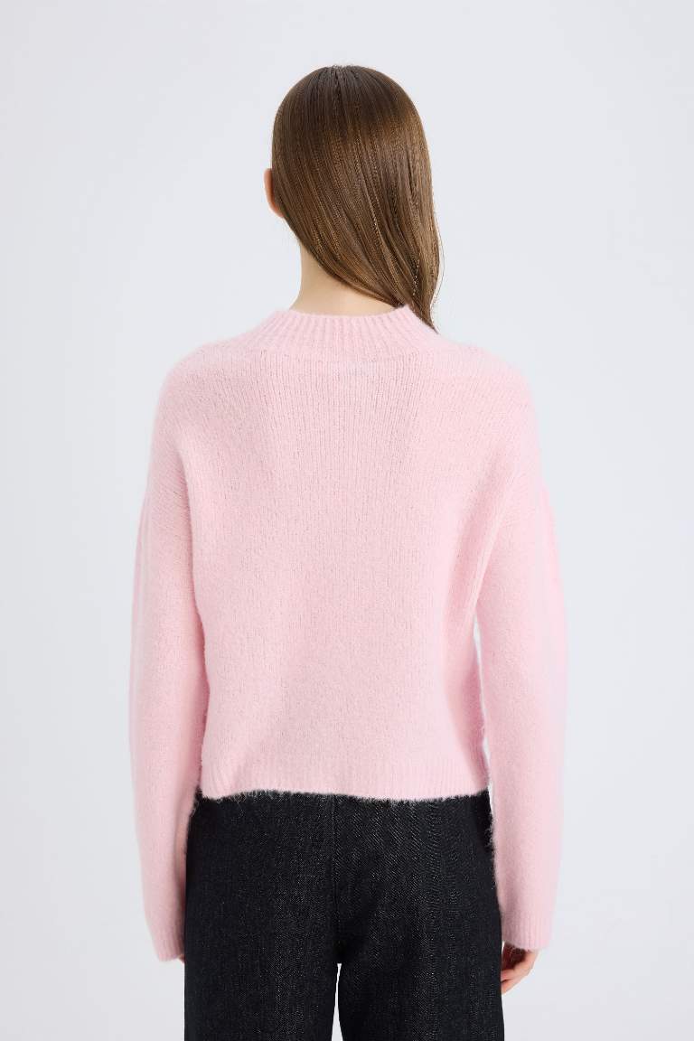 Pull tricot basique sans couture à col rond et coupe régulière