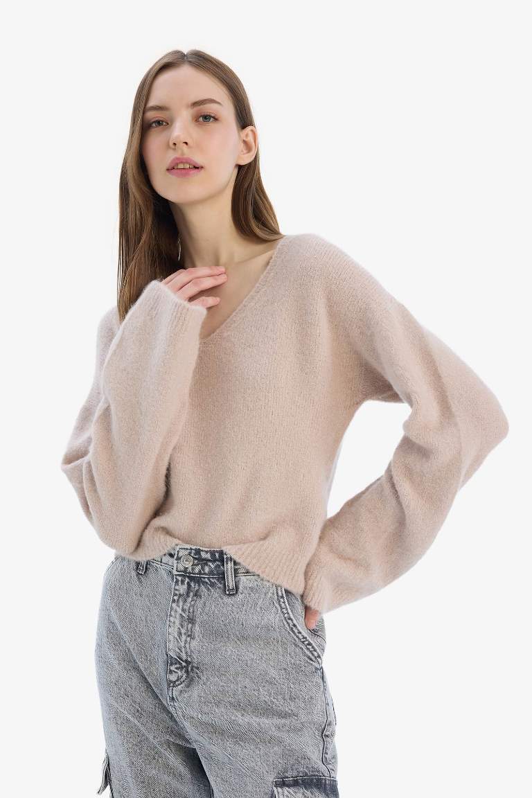 Pull en tricot basique sans couture à col V et coupe régulière