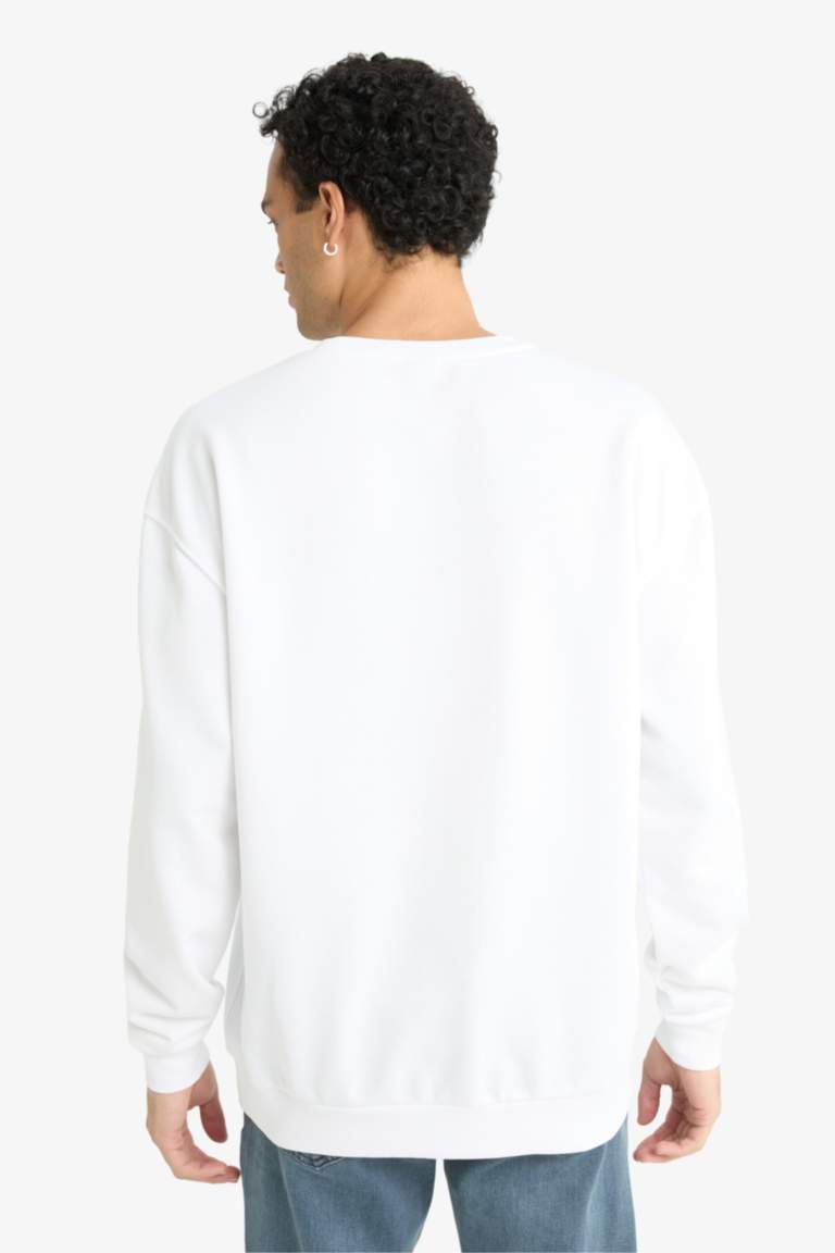 سويت شيرت أوفر سايز برقبة مستديرة