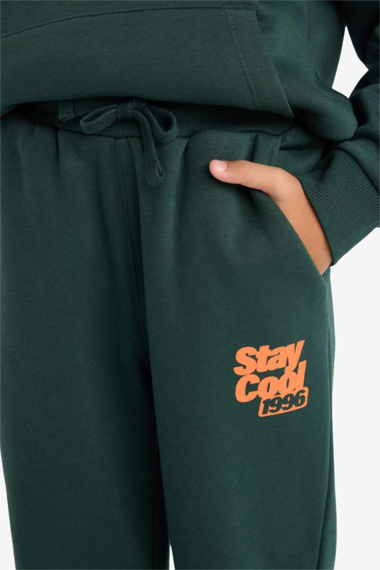 سروال رياضي أولاد بطبعة شعار قماش سميك قصة عادية بخصر مطاطي