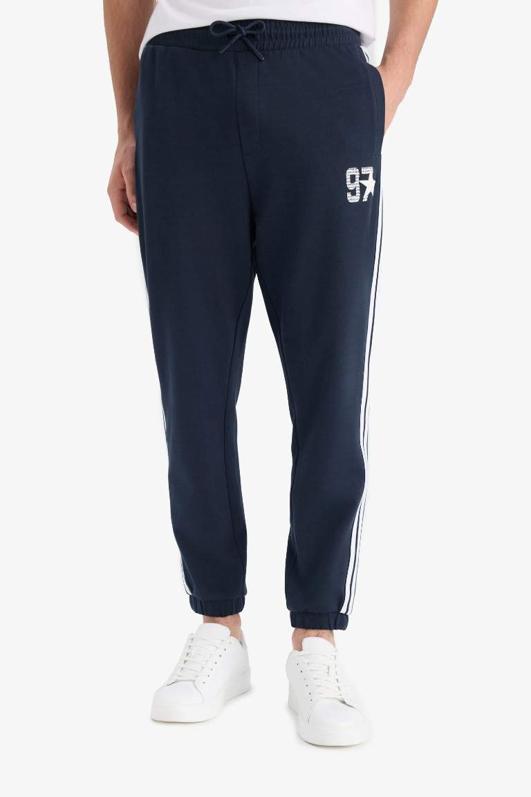 Regular Fit Beli Bağcıklı Cepli Paçası Lastikli Baskılı Jogger Eşofman Altı