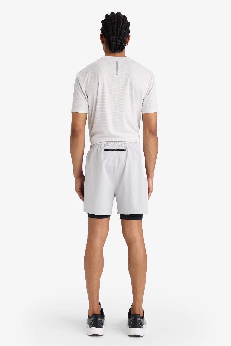 Тканые спортивные шорты DeFactoFit Slim Fit с узкими штанинами и встроенными леггинсами