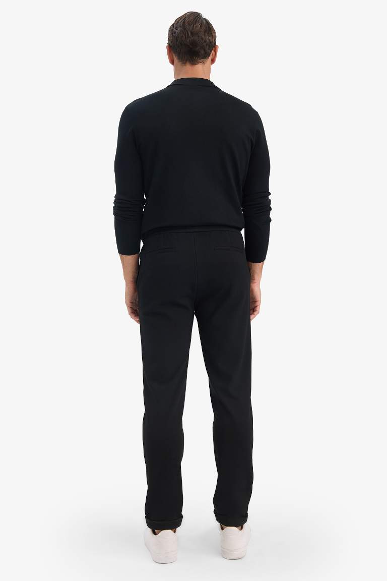 Pantalon classique noir à jambe courte
