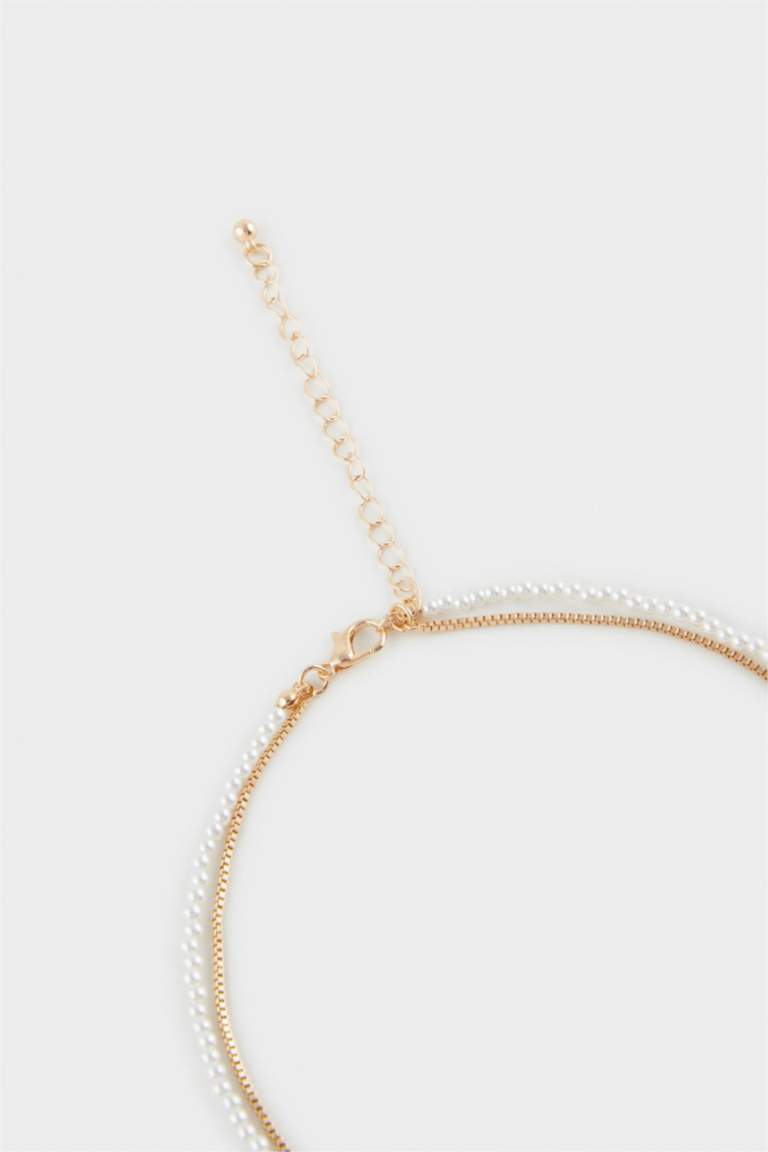 Әйелдерге алқа